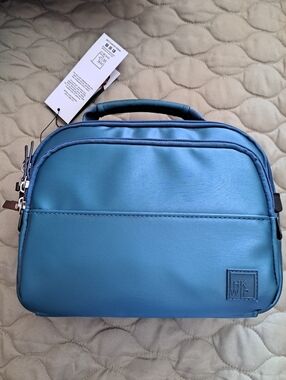 Ihkwip Xĺ Cosmo Metallic Teal Bag